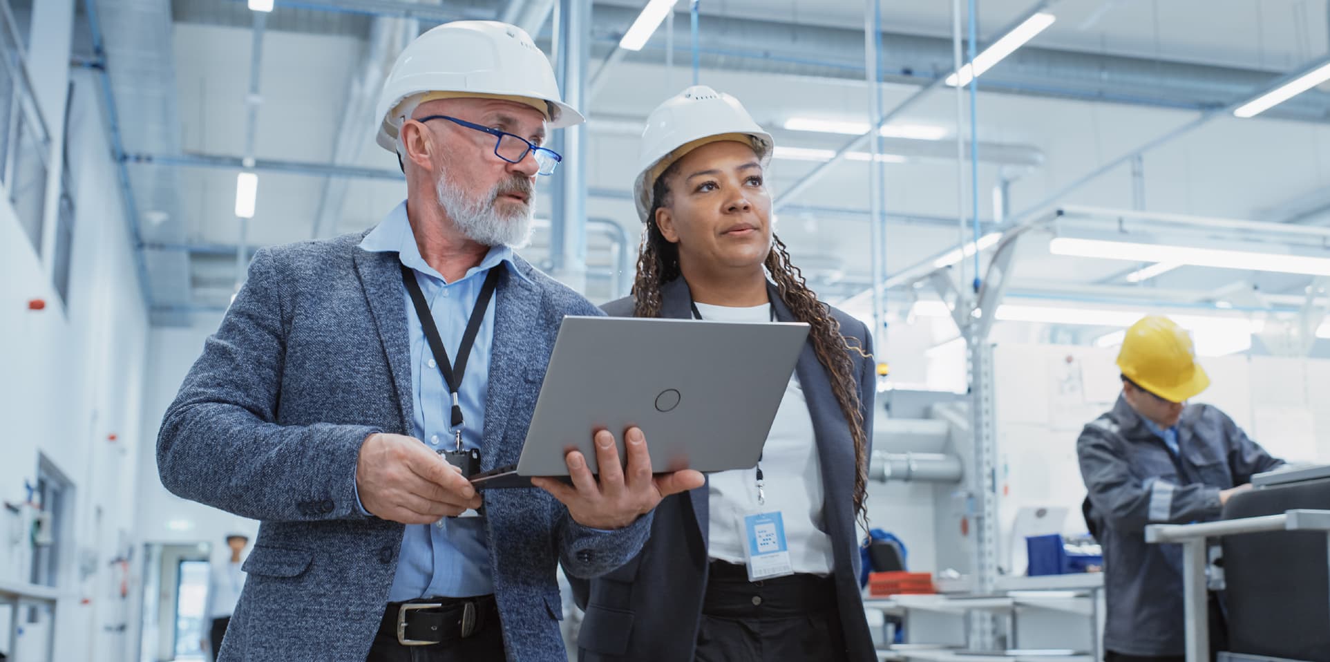 two engineers are discussing the proiects